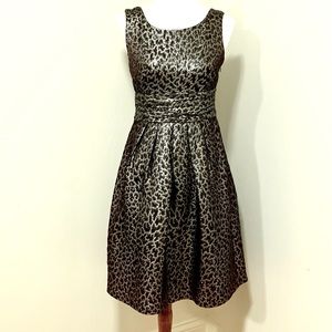 A glossy Micheal Kors dress